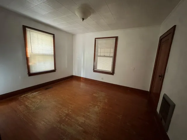 an empty room with windows