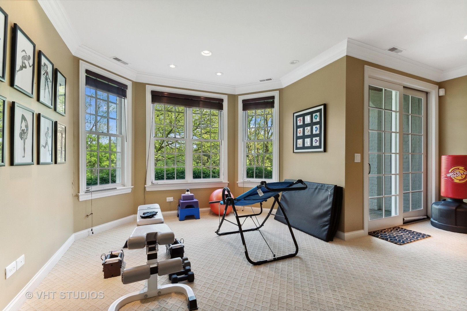 34 Oak Knoll Road Barrington Hills, IL 60010 - Photo 60 of 82 a living room with furniture and floor to ceiling windows