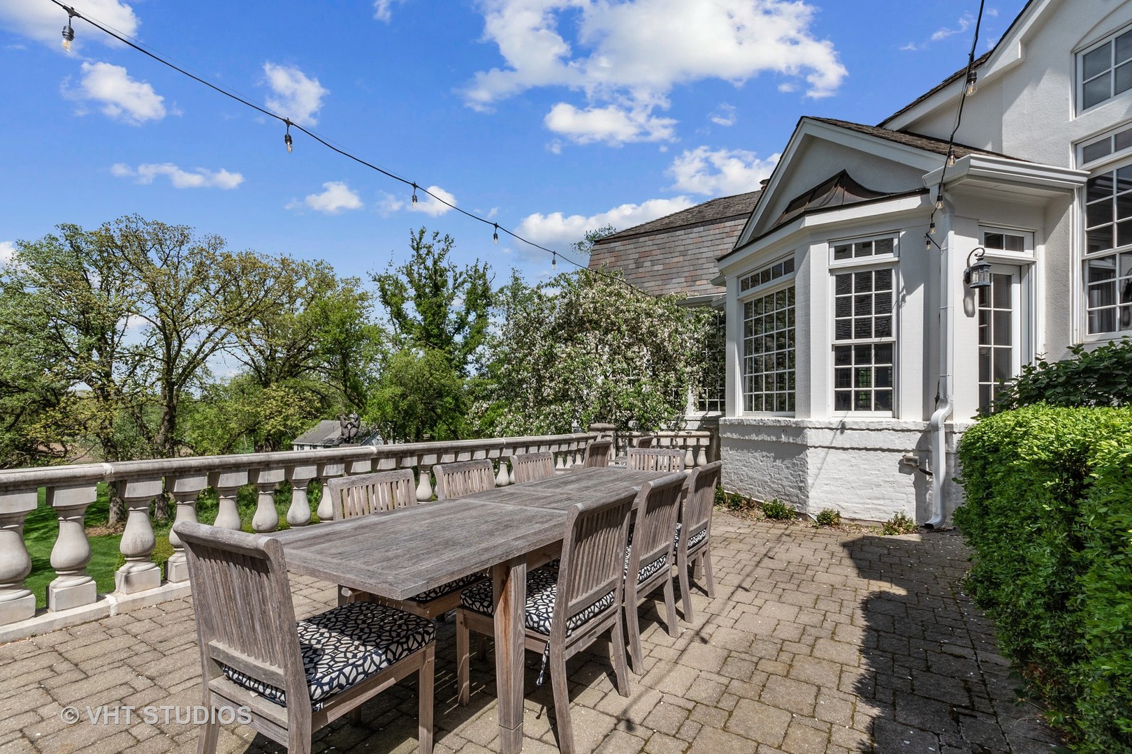 34 Oak Knoll Road Barrington Hills, IL 60010 - Photo 69 of 82 a view of a wooden chairs and table in the patio