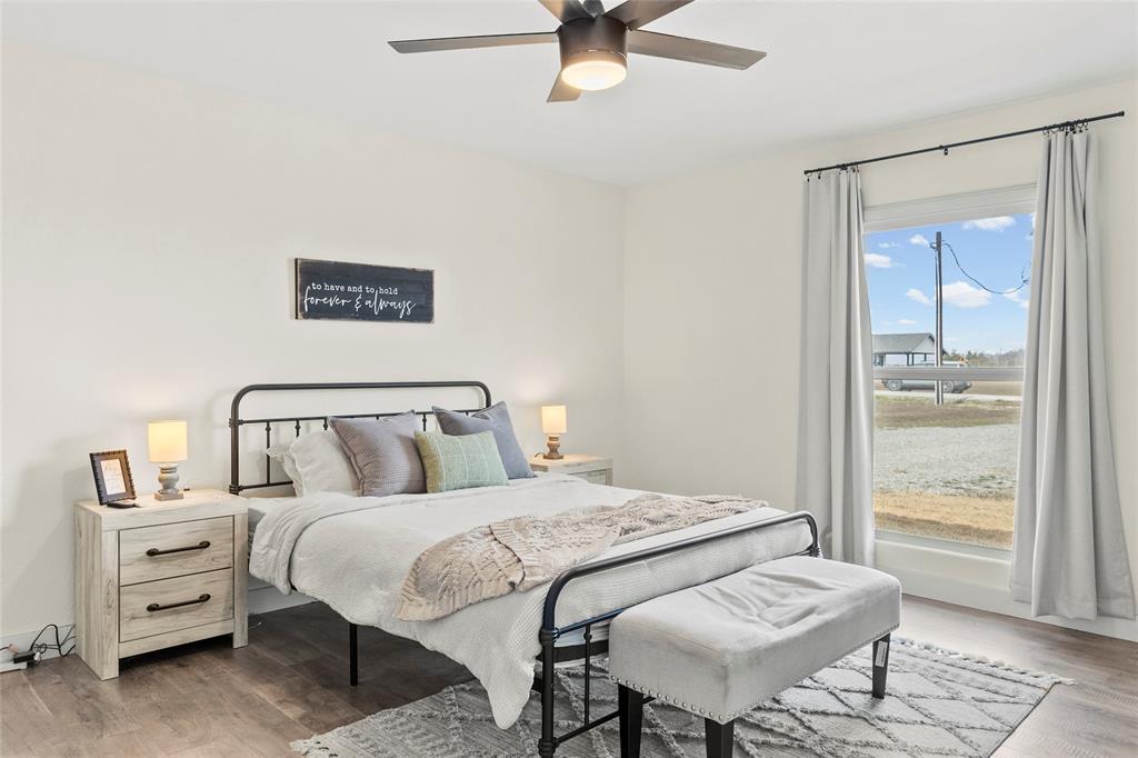 170 Private Road Brookston, TX 75421 - Photo 22 of 33 a bedroom with a bed and with furniture