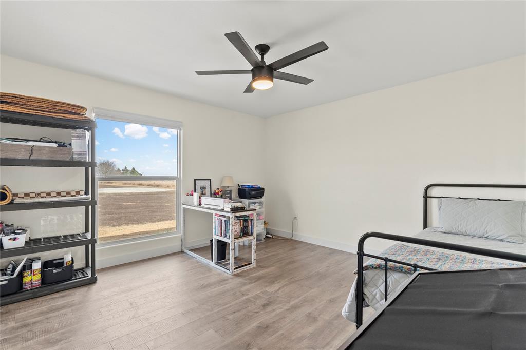 170 Private Road Brookston, TX 75421 - Photo 26 of 33 a work room with stairs and furniture