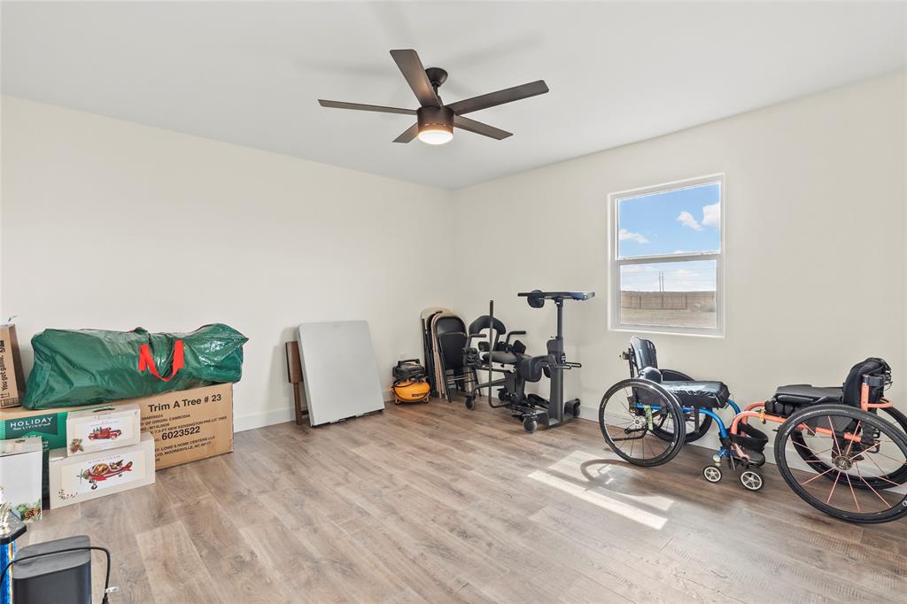 170 Private Road Brookston, TX 75421 - Photo 29 of 33 a view of a room with gym equipment