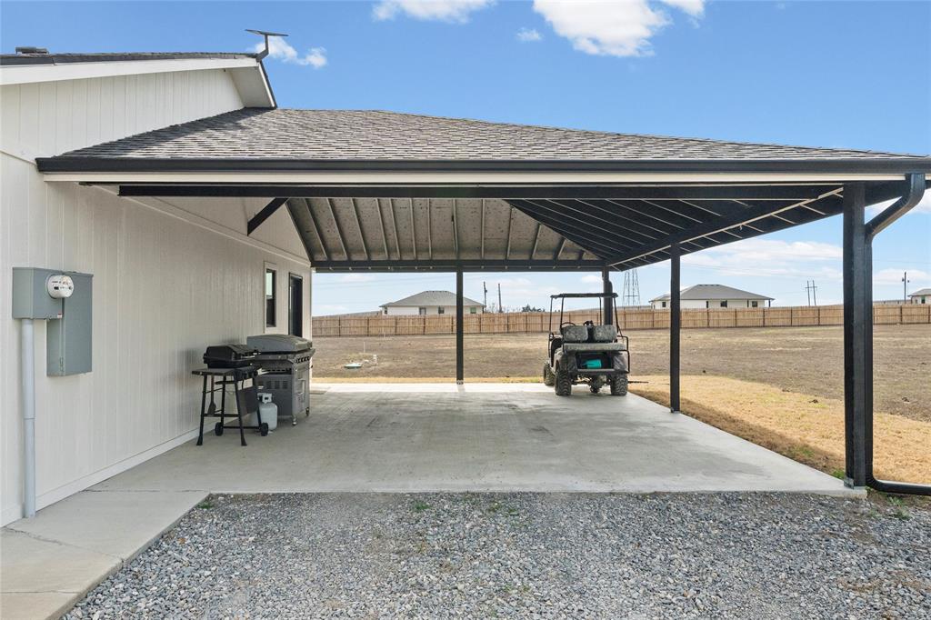 170 Private Road Brookston, TX 75421 - Photo 3 of 33 a view of a two room with wooden floor