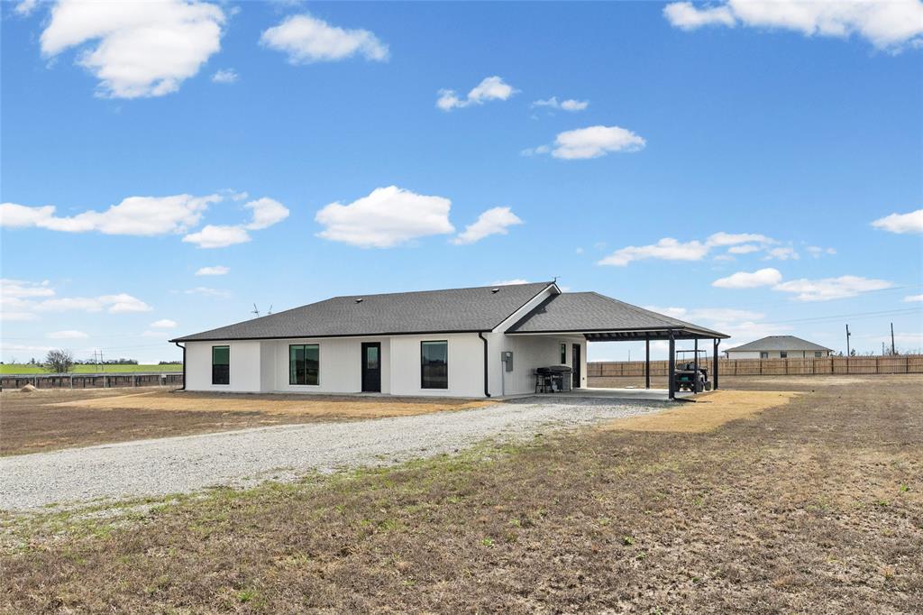 170 Private Road Brookston, TX 75421 - Photo 33 of 33 a front view of a house with a yard