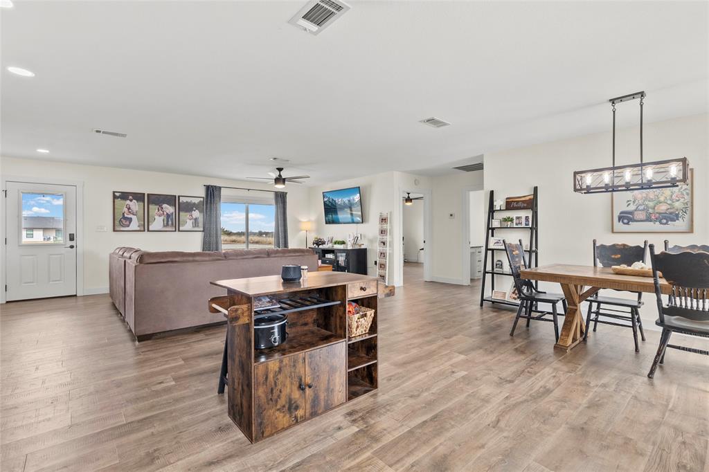 170 Private Road Brookston, TX 75421 - Photo 7 of 33 a living room with furniture and a dining table