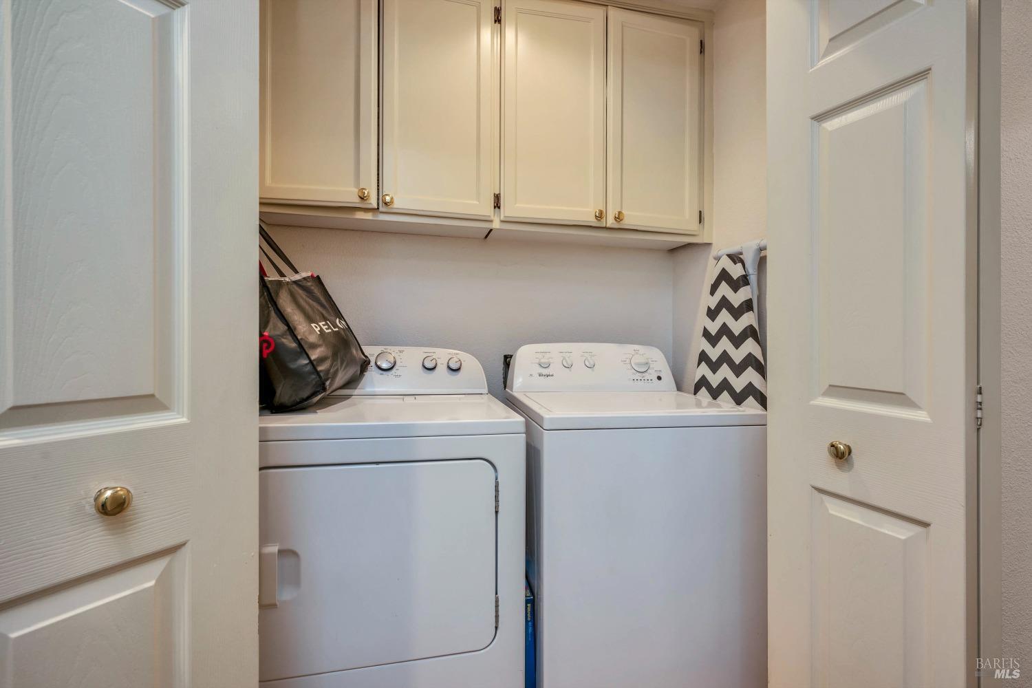 921 Chiles Avenue St. Helena, CA 94574 - Photo 16 of 20 a utility room with dryer and washer