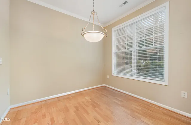 a view of a room with windows