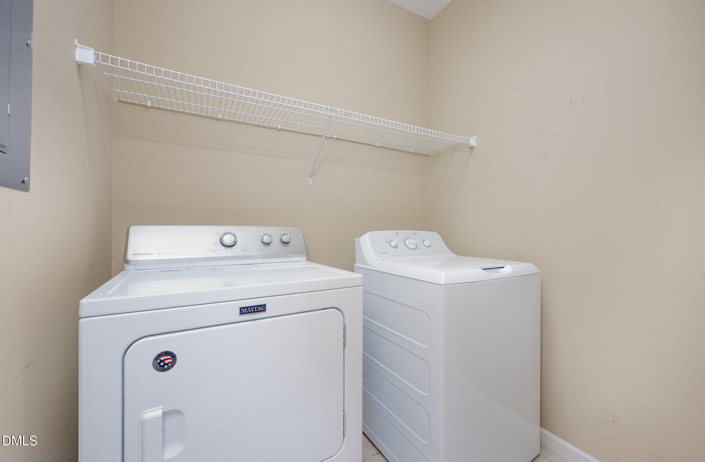 8041 Allyns Landing Way, Unit 101 Raleigh, NC 27615 - Photo 24 of 32 a utility room with dryer and washer