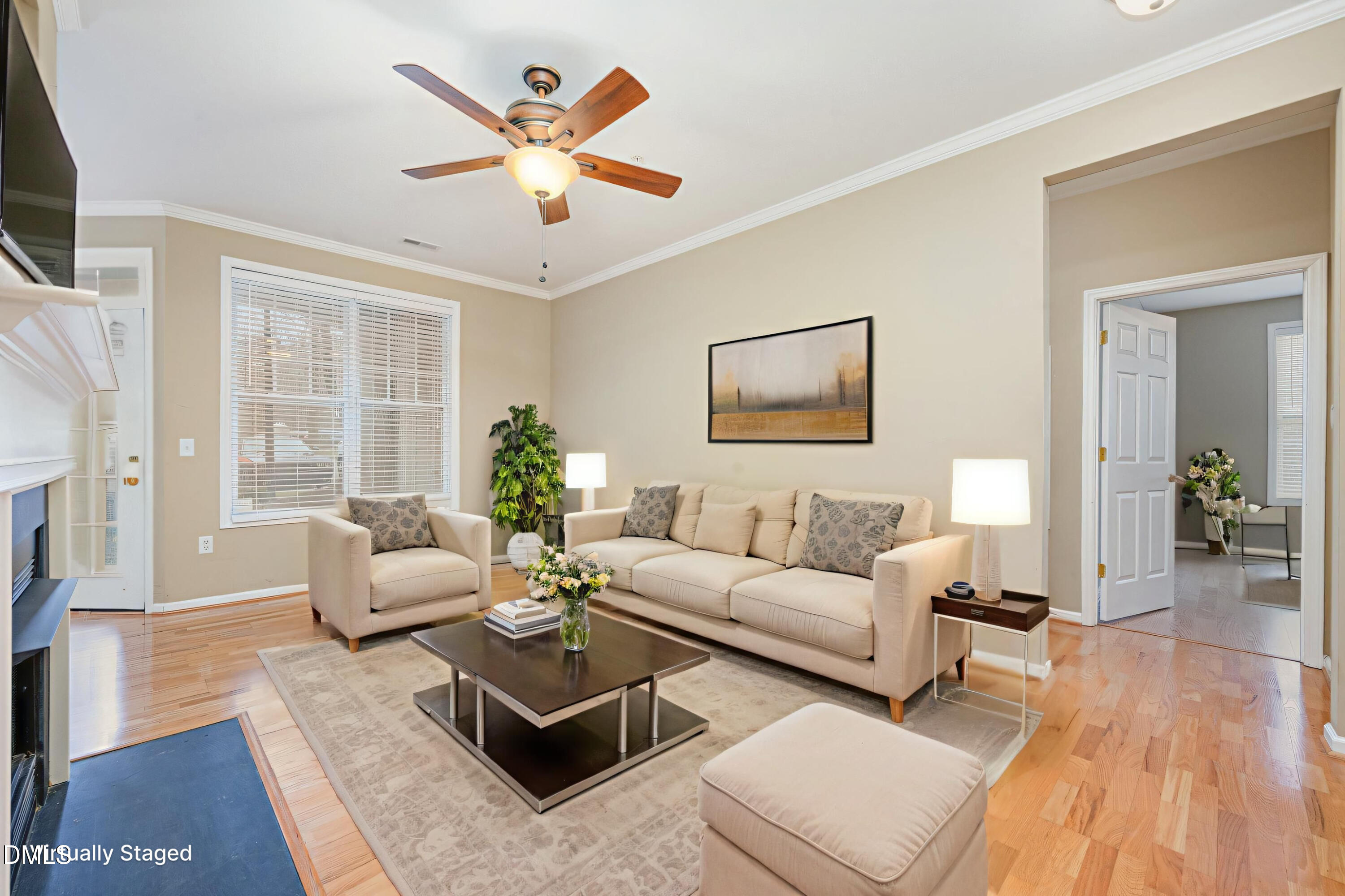 8041 Allyns Landing Way, Unit 101 Raleigh, NC 27615 - Photo 7 of 32 a living room with furniture and a large window