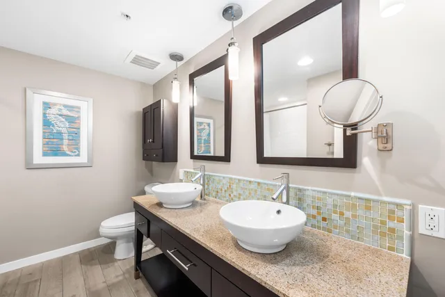 a bathroom with a bathtub and a shower