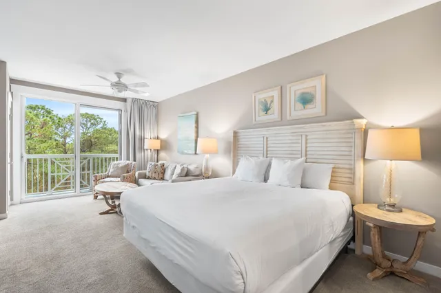 a bedroom with a bed and a chair