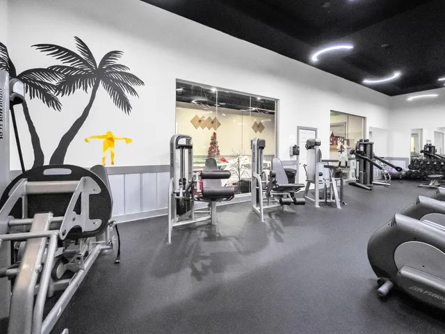 a view of a room with gym equipment
