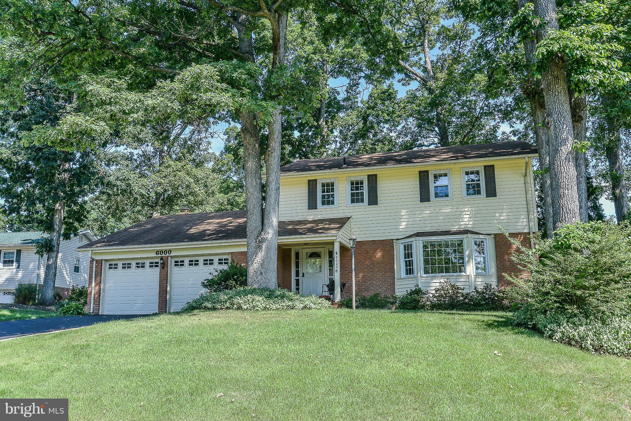 6000 Filbert Court Springfield, VA 22152 - Photo 1 of 21 front view of a house with a yard