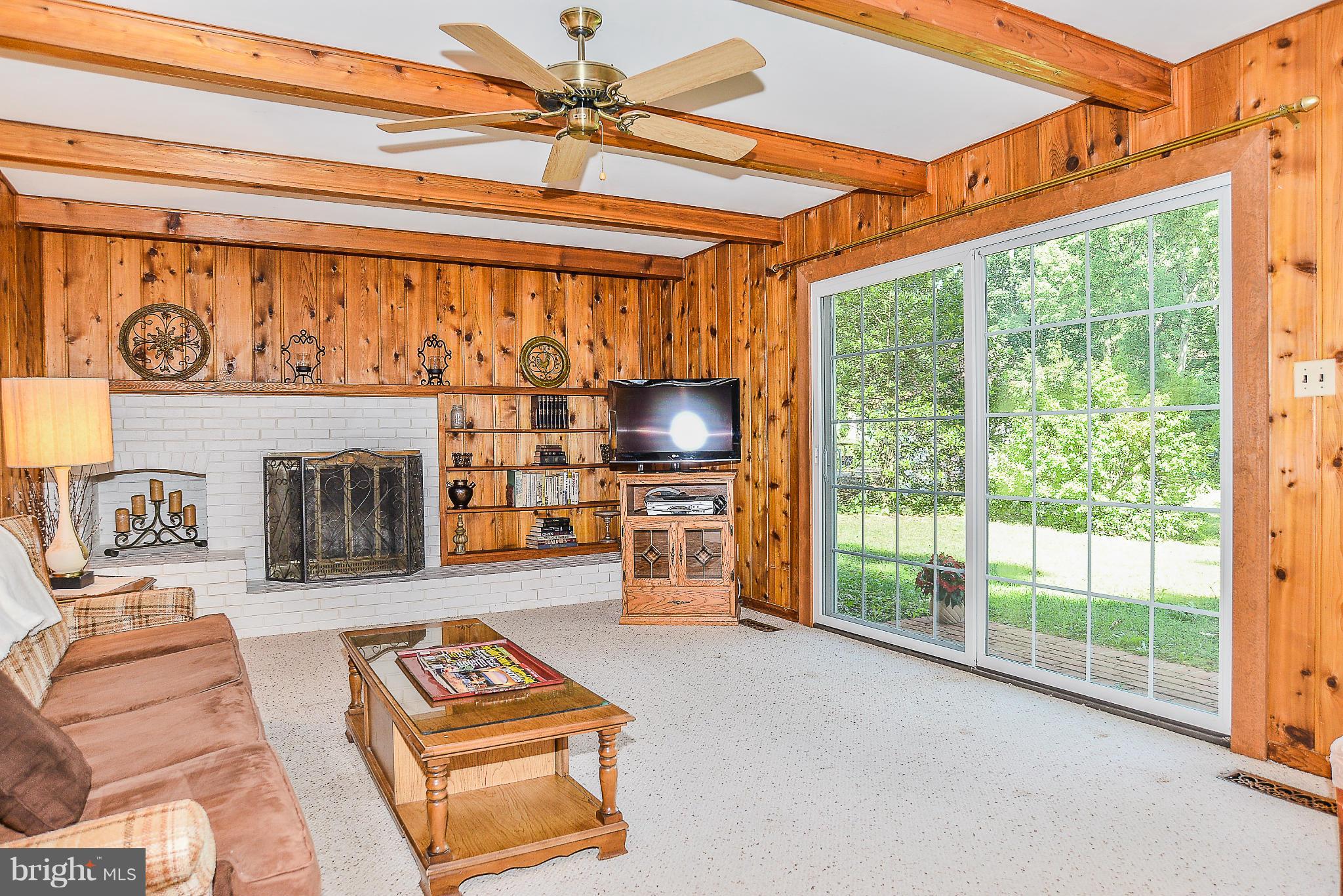 6000 Filbert Court Springfield, VA 22152 - Photo 11 of 21 a living room with furniture and a fireplace
