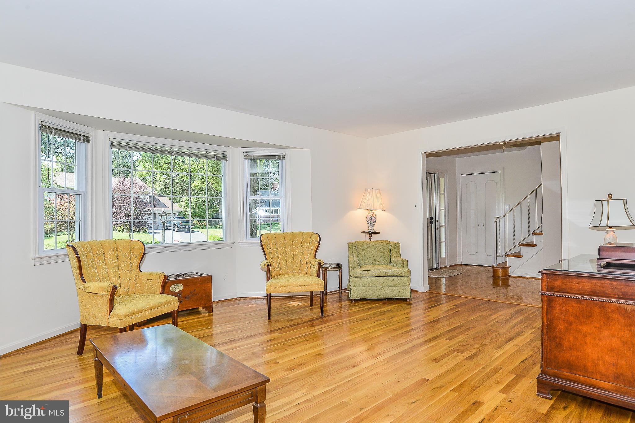 6000 Filbert Court Springfield, VA 22152 - Photo 5 of 21 a living room with furniture and a large window