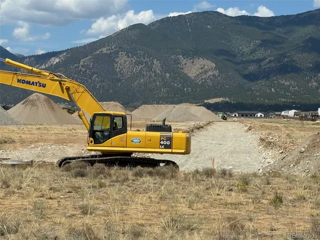 a view of swimming pool with a yard