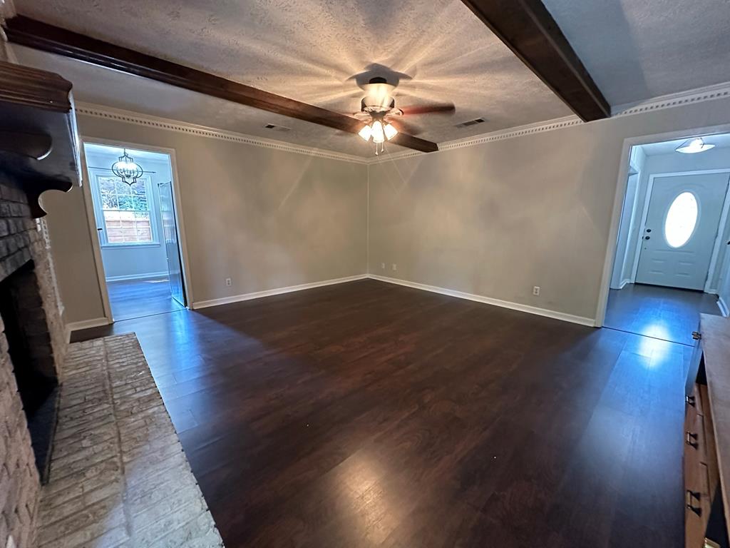 6838 Buckeye Way Columbus, GA 31904 - Photo 17 of 34 wooden floor in an empty room with a window