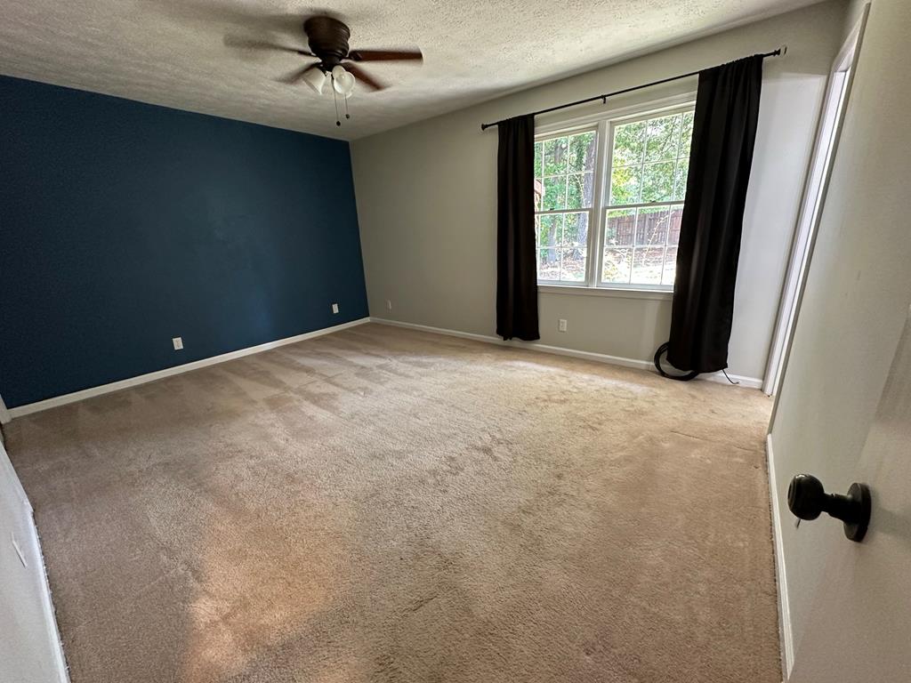 6838 Buckeye Way Columbus, GA 31904 - Photo 20 of 34 a view of an empty room with a window