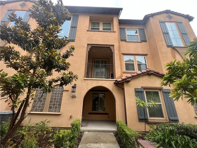a front view of a house with a garage