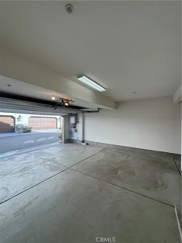 a view of a building with a parking space