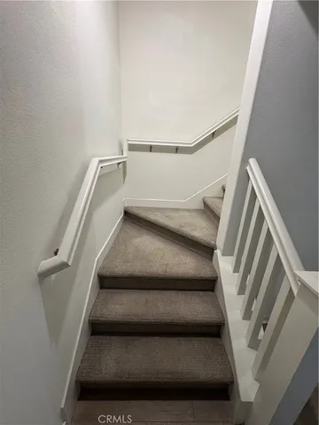 a view of a bathroom with a glass door