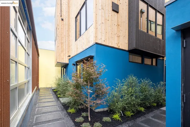 a view of a house with a street
