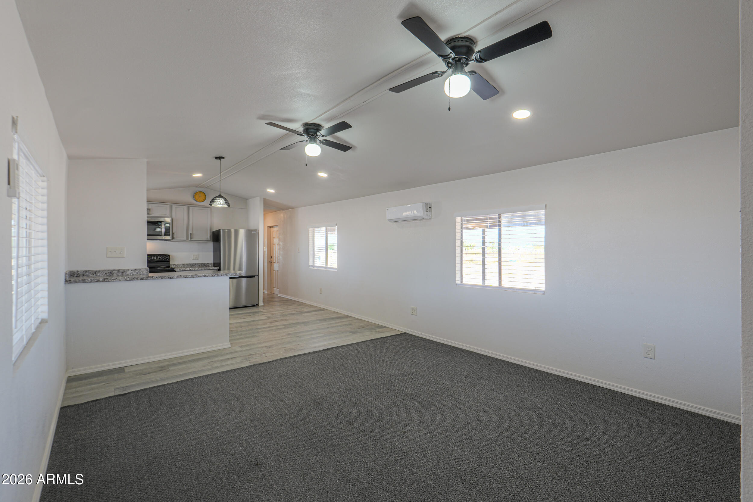 33776 West Siesta Road Stanfield, AZ 85172 - Photo 33 of 54 a view of an empty room with a window