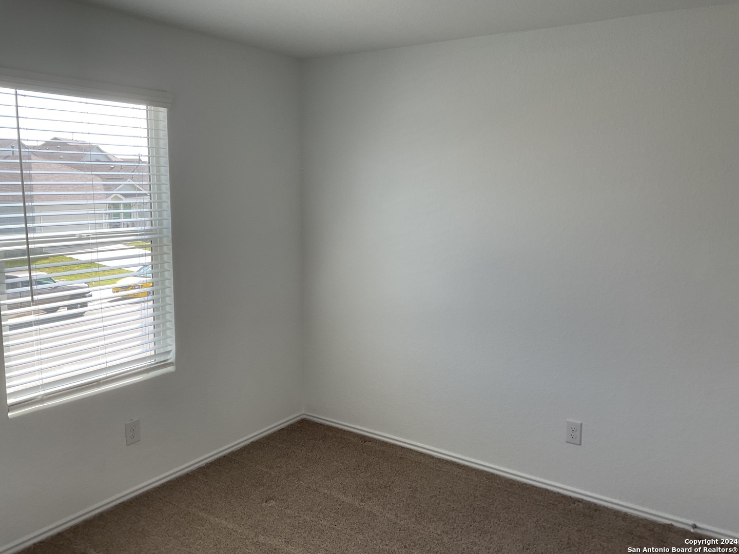 5813 Companion Loop Bulverde, TX 78163 - Photo 17 of 28 an empty room with a window