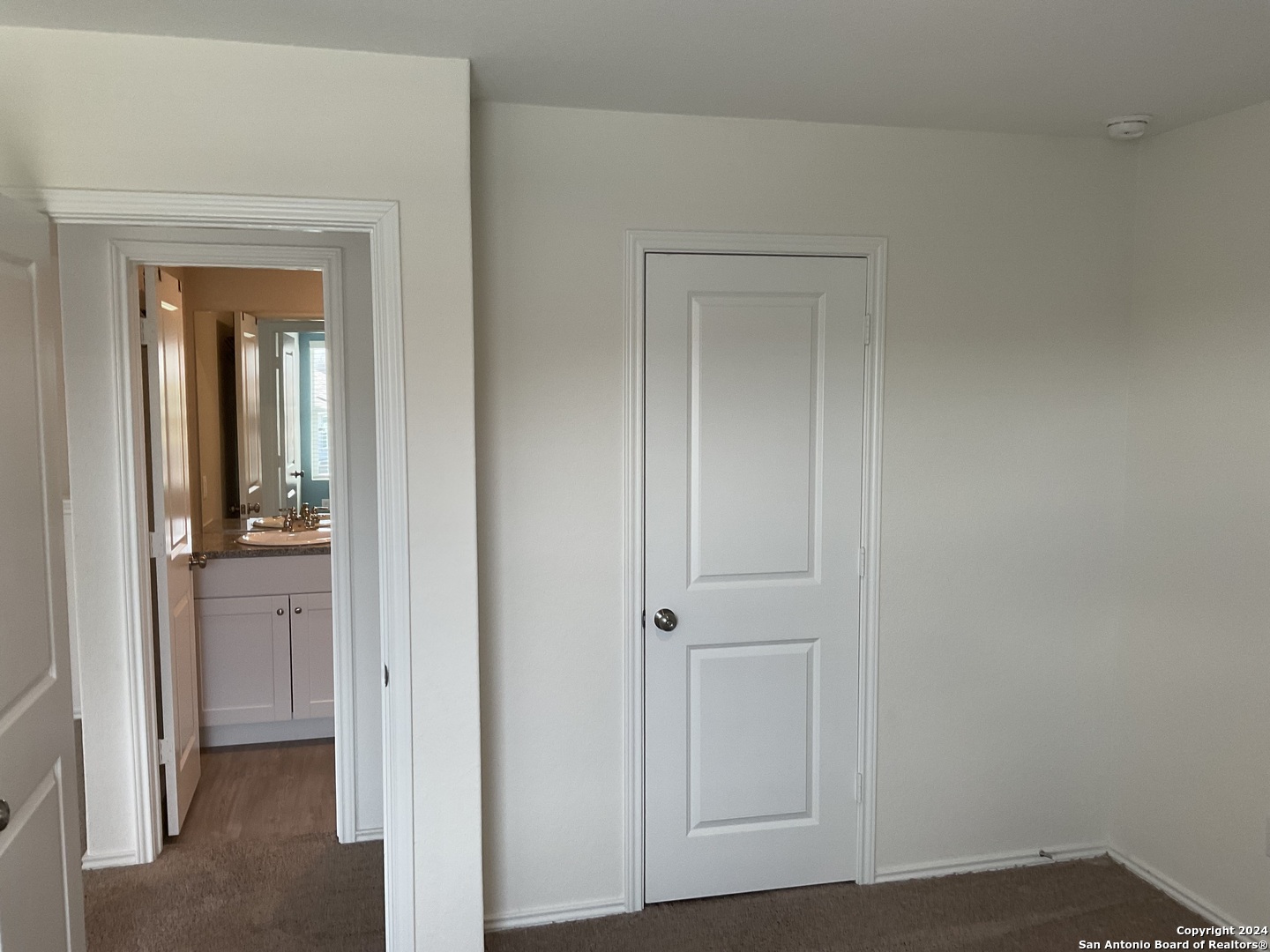 5813 Companion Loop Bulverde, TX 78163 - Photo 23 of 28 a view of a livingroom from a hallway