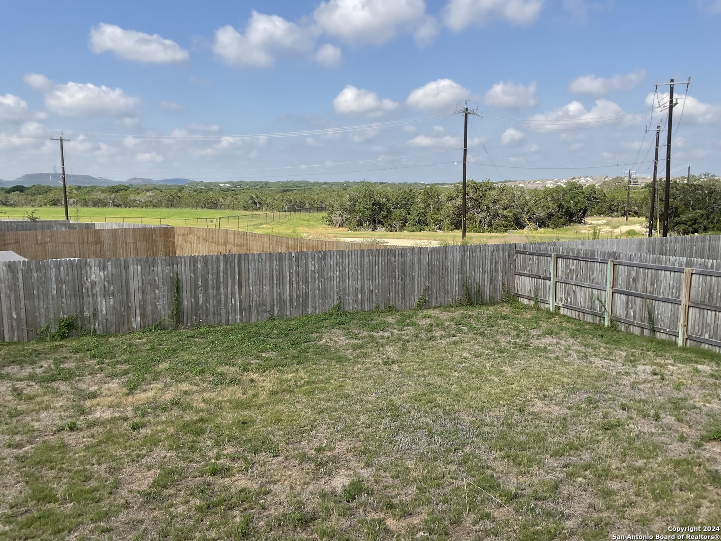 5813 Companion Loop Bulverde, TX 78163 - Photo 26 of 28 a view of a garden with a slide