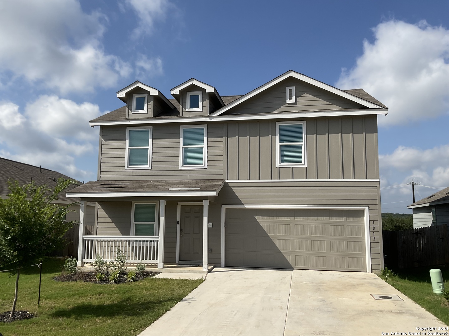 5813 Companion Loop Bulverde, TX 78163 - Photo 27 of 28 a front view of a house with garden