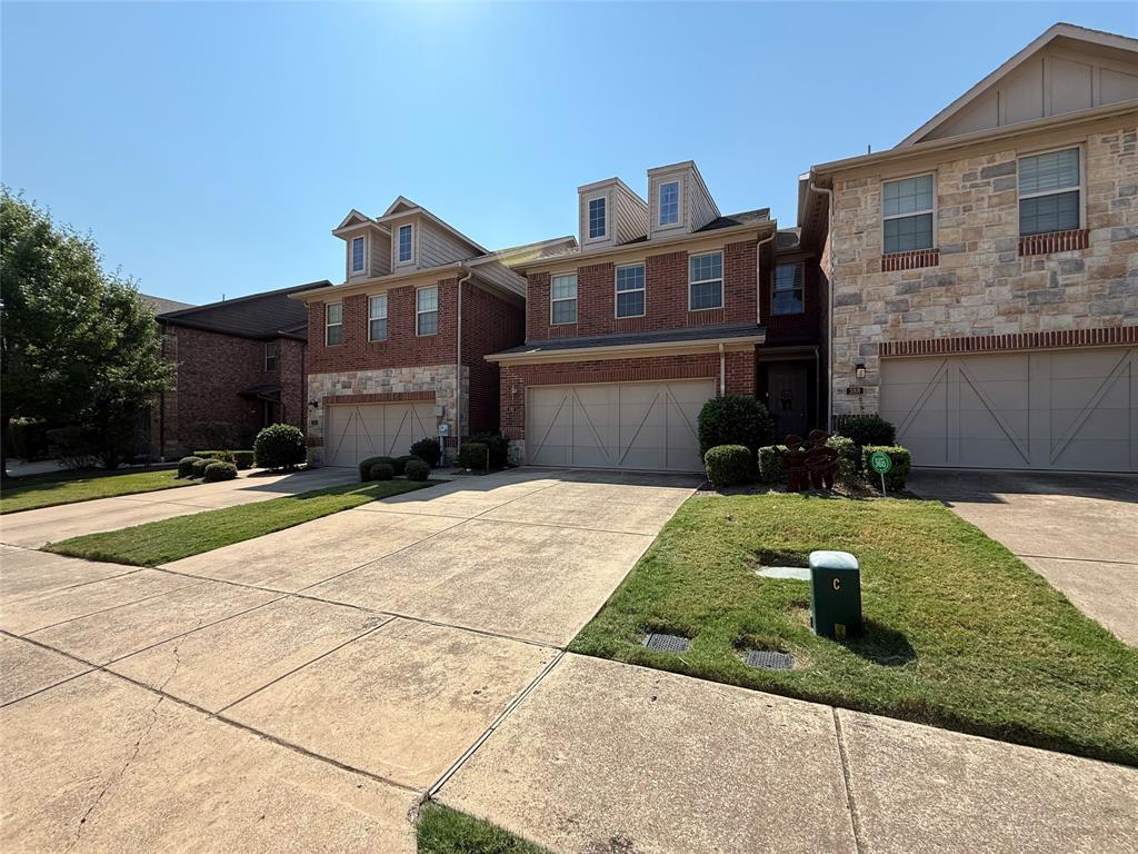392 Dublin Street Lewisville, TX 75067 - Photo 2 of 21 a front view of a house with garden