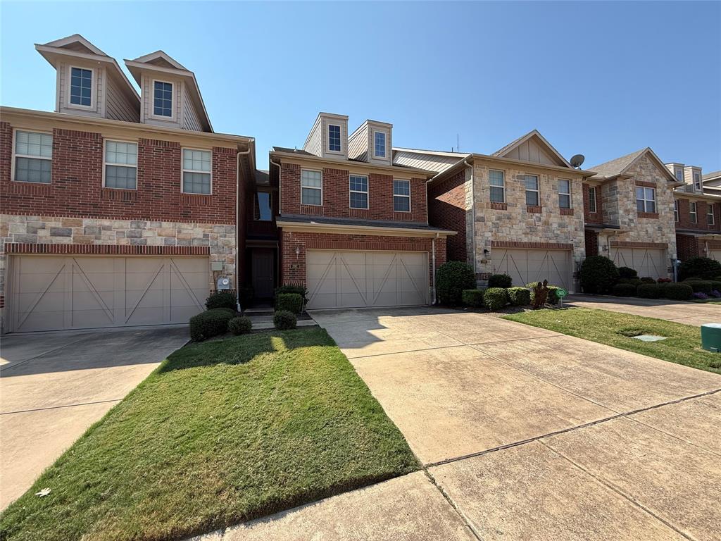 392 Dublin Street Lewisville, TX 75067 - Photo 3 of 21 a front view of a house with garden