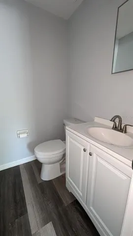a bathroom with a toilet and a sink