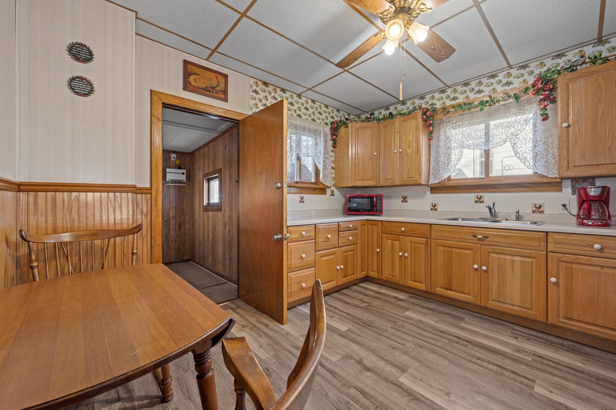 644 Oak Avenue Aurora, IL 60506 - Photo 12 of 21 a kitchen with sink cabinets and window