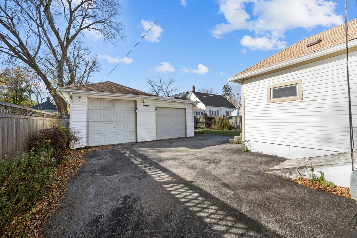 644 Oak Avenue Aurora, IL 60506 - Photo 2 of 21 a view of a house with a yard and garage