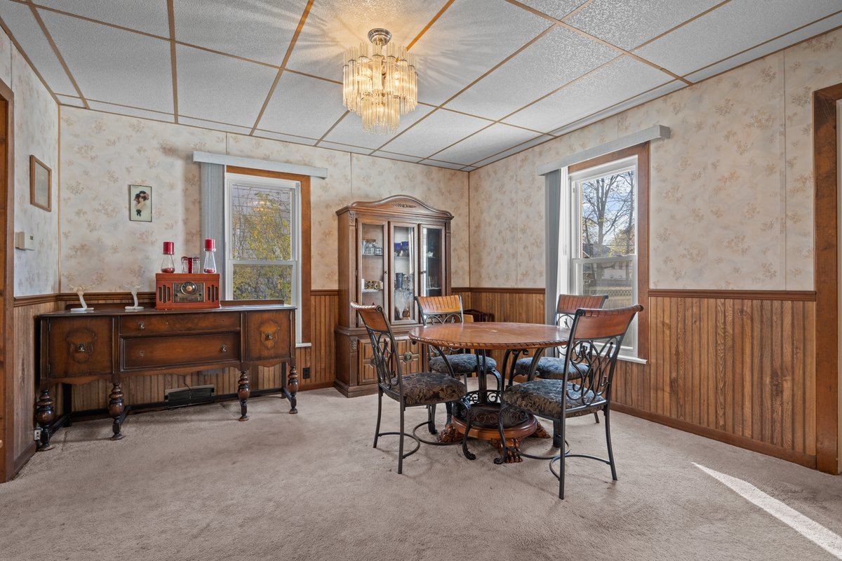 644 Oak Avenue Aurora, IL 60506 - Photo 8 of 21 a view of a dining room with furniture window and wooden floor
