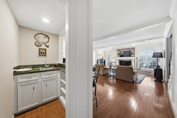 a view of living room with furniture and flat screen tv