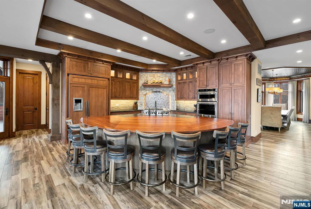 1 Lakeview Point Avenue Branchville, NJ 07826 - Photo 11 of 50 an open kitchen with dining table and chairs