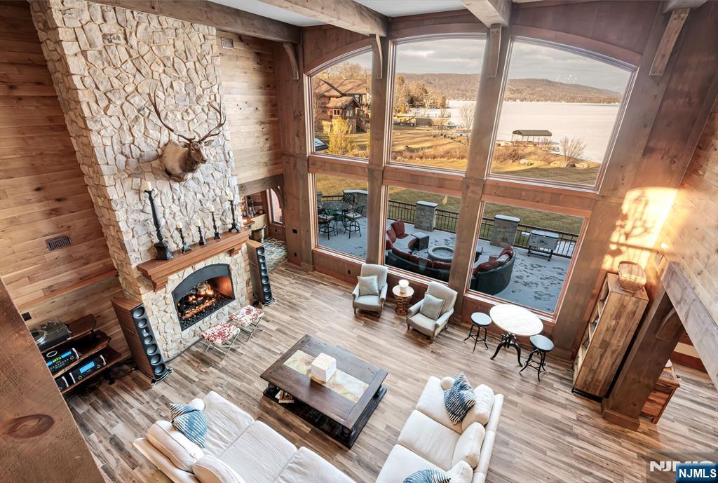 1 Lakeview Point Avenue Branchville, NJ 07826 - Photo 22 of 50 a living room with furniture and a fireplace