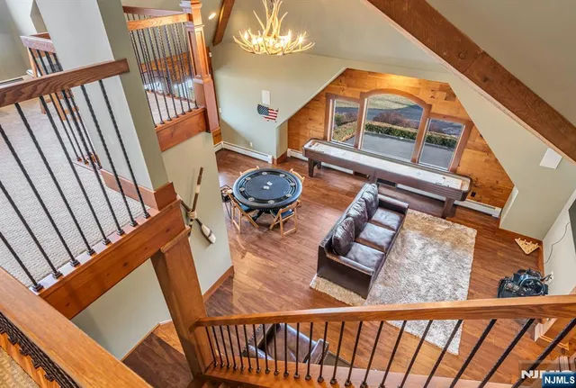 a view of living room with furniture and floor to ceiling window