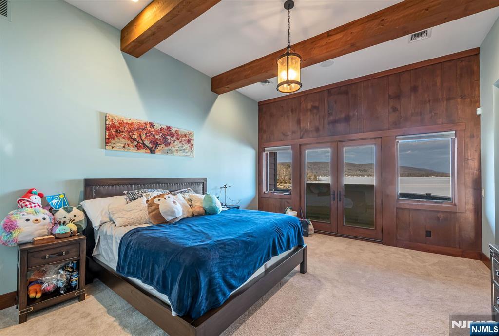 1 Lakeview Point Avenue Branchville, NJ 07826 - Photo 30 of 50 a bedroom with a bed and a large window