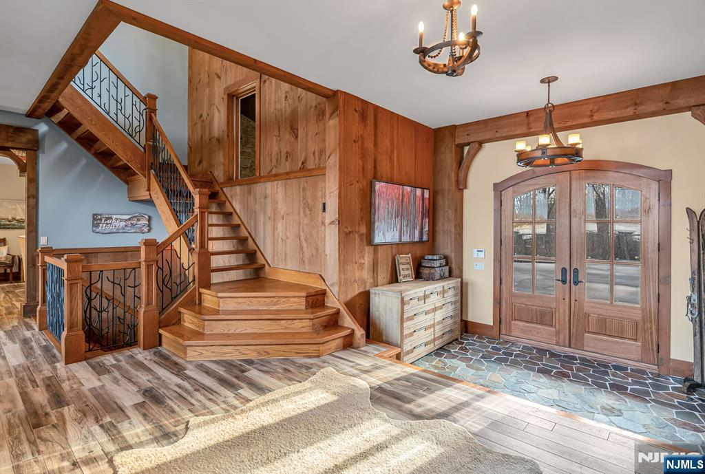 1 Lakeview Point Avenue Branchville, NJ 07826 - Photo 3 of 50 a view of a livingroom with furniture staircase and a chandelier