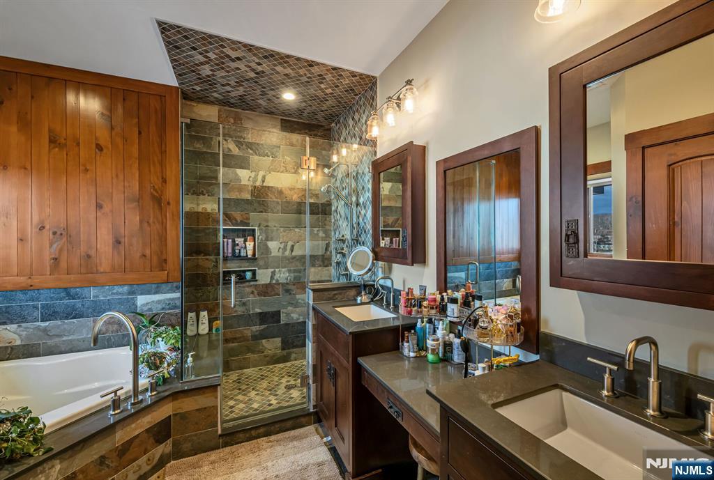 1 Lakeview Point Avenue Branchville, NJ 07826 - Photo 31 of 50 a bathroom with a tub sink and mirror