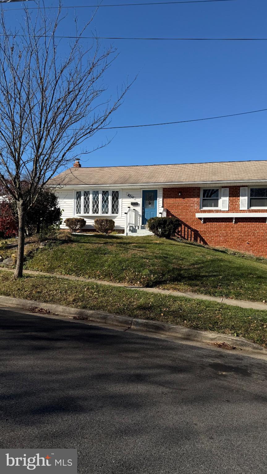 8314 Nicholson Street Hyattsville, MD 20784 - Photo 2 of 3 a view of a yard with an outdoor space