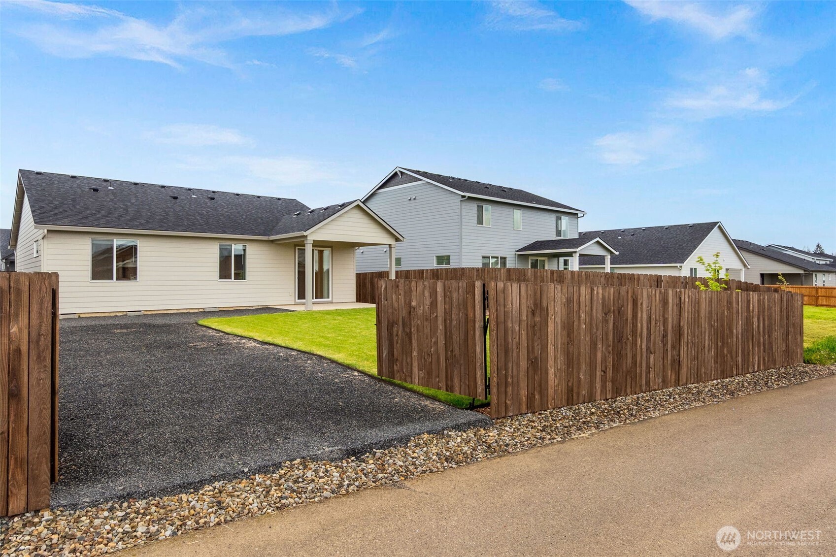 504 Pagget Avenue Winlock, WA 98596 - Photo 25 of 27 a view of a house with a wooden fence