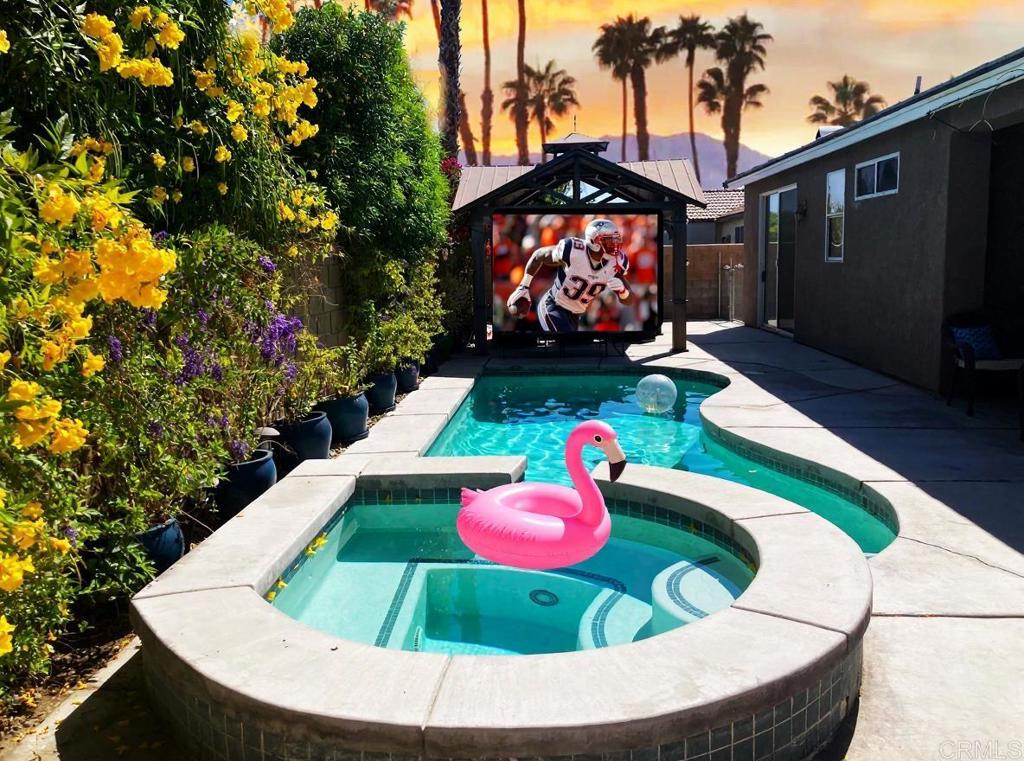 80596 Key Largo Avenue Indio, CA 92201 - Photo 8 of 59 a view of outdoor sitting area with swimming pool