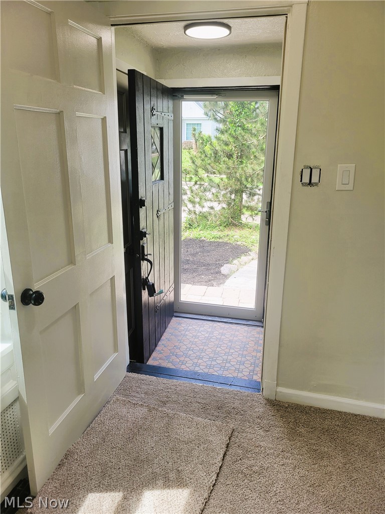 1557 Maplegrove Road South Euclid, OH 44121 - Photo 7 of 23 Entryway with carpet flooring