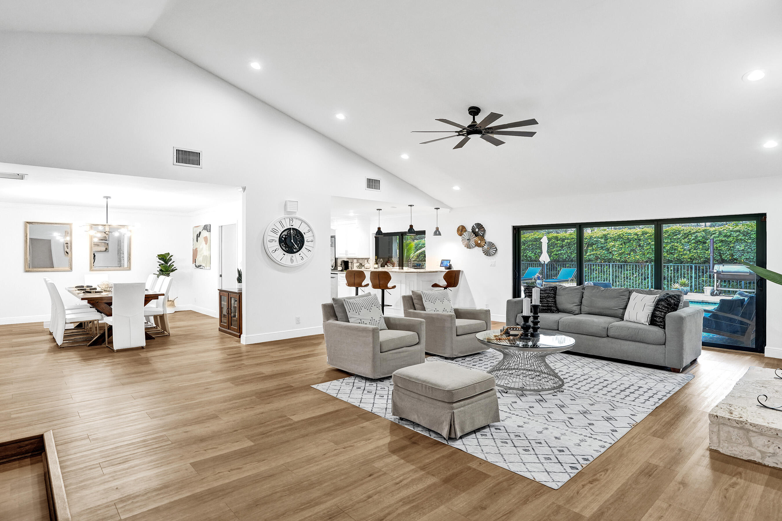 2413 Northwest 40th Circle Boca Raton, FL 33431 - Photo 12 of 66 a living room with furniture and a large window