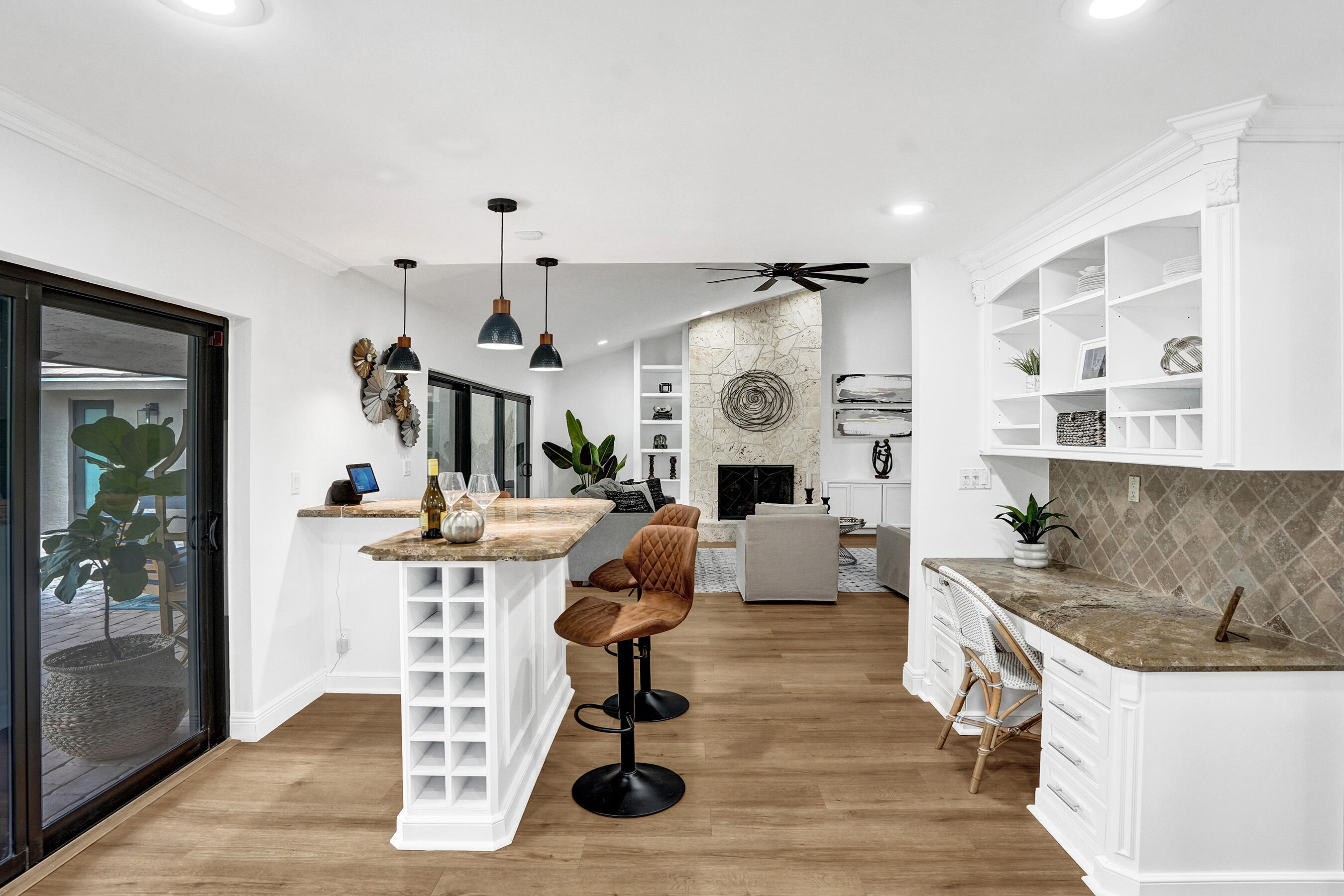2413 Northwest 40th Circle Boca Raton, FL 33431 - Photo 24 of 66 a living room with furniture and a fireplace